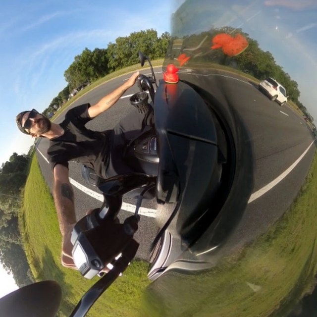 Mike Rides Daily riding through Central Florida, shot on a 360 camera so the road curls around him