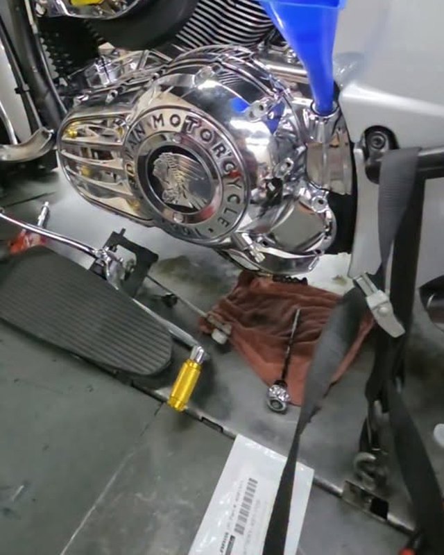 Mike&rsquo;s Indian up on the lift, chrome engine case and floorboard in frame